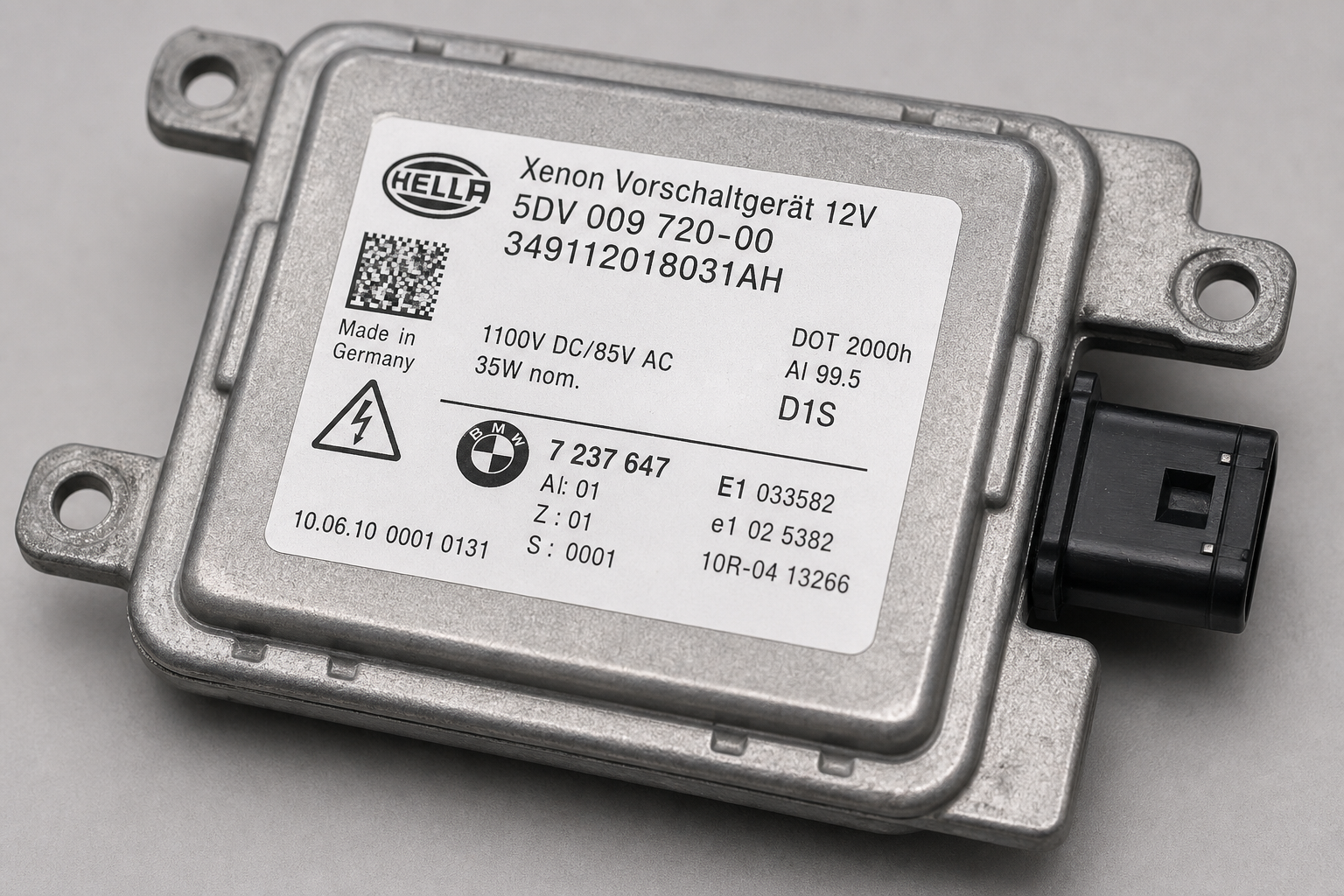 Close-up of xenon ballast module identification label with OE part numbers